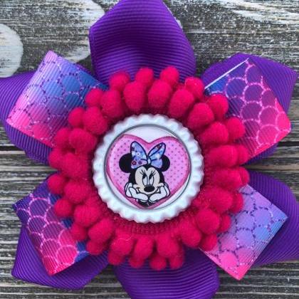 Rainbow Minnie Mouse inspired bow.
